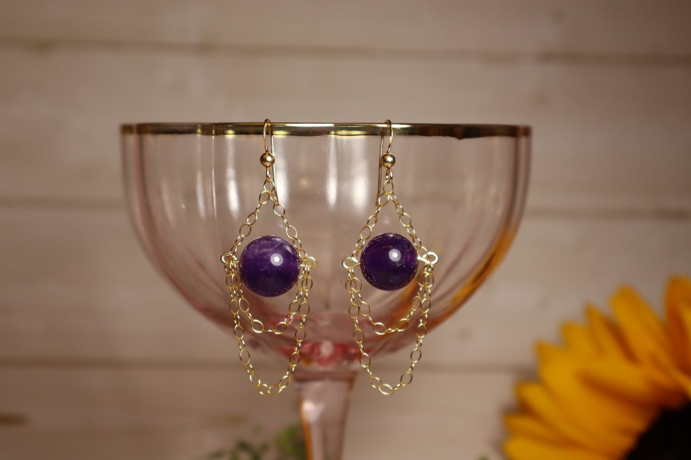 Triple moon necklace in a pink gift box with flowers